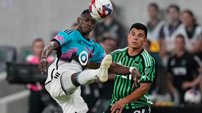 Minnesota United forward Mender GarcÃ­a kicks the ball next to Austin FC defender Nick Lima (24) during the second half of an MLS soccer match Wednesday, May 31, 2023, in Austin, Texas. (AP Photo/Eric Gay)