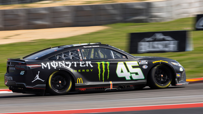 Tyler Reddick steers through Turn 15 during a NASCAR Cup Series auto race at Circuit of the Americas, Sunday, March 26, 2023, in Austin, Texas. (AP Photo/Stephen Spillman)