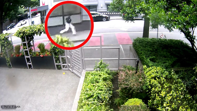 This still image from newly released video shows the moment a man ran up to Eina Kwon's car in Seattle on June 13, 2023, and opened fire, killing Kwon and injuring her husband. (Photo: KCPAO)