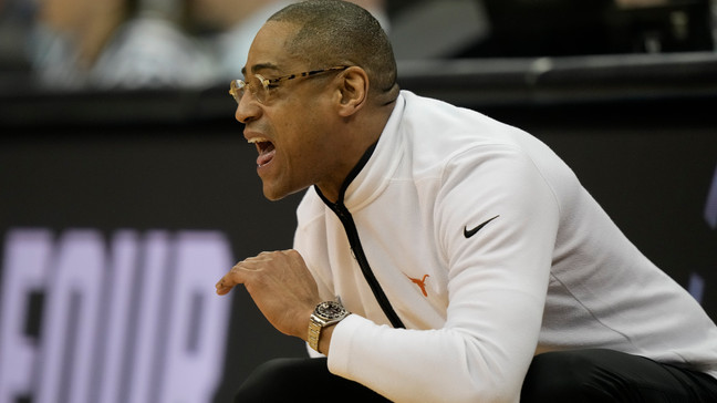 Texas head coach Rodney Terry yells in the first half of a Sweet 16 college basketball game against Xavier in the Midwest Regional of the NCAA Tournament Friday, March 24, 2023, in Kansas City, Mo. (AP Photo/Charlie Riedel)