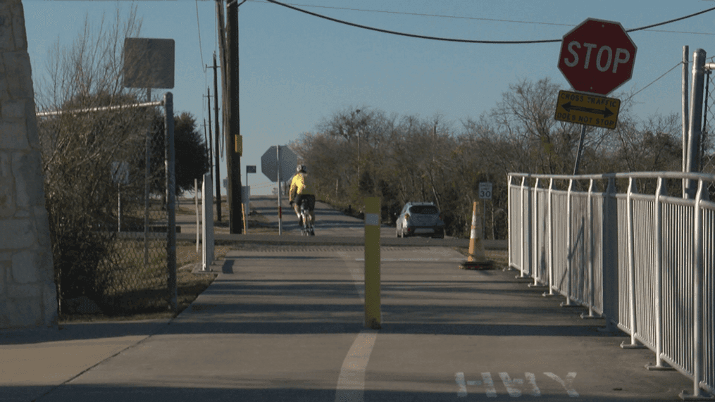 The Texas Department of Transportation has plans to make the crossing at the Walnut Creek Hike and Bike trail near Walter E. Long Lake safer, but so far those have hit a speed bump (Photo: CBS Austin)